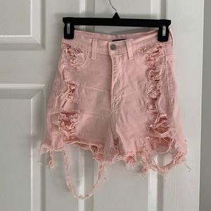 Peachy pink distressed shorts